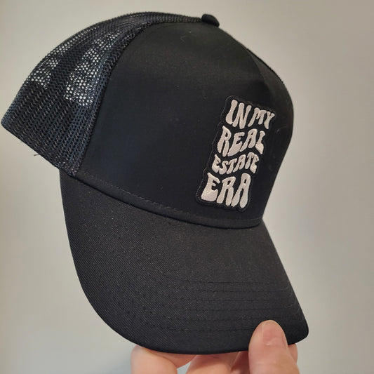 “In My Real Estate Era” Black Trucker Hat – 5 Panel Snapback