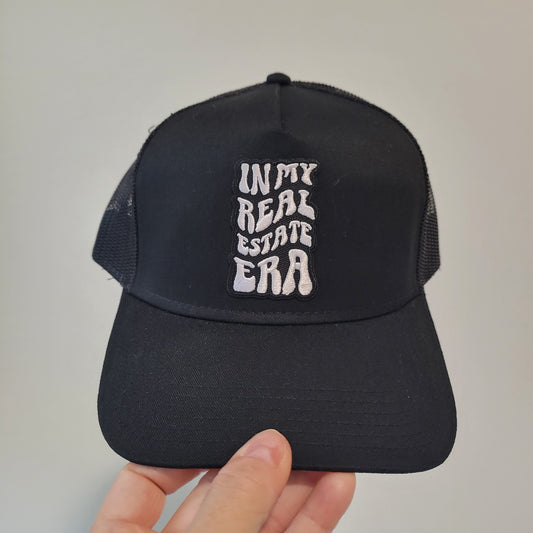 “In My Real Estate Era” Black Trucker Hat – 5 Panel Snapback